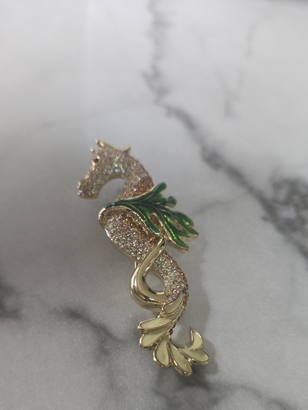 Rucinni Seahorse Crystal Brooch with Green Enamel Leaves